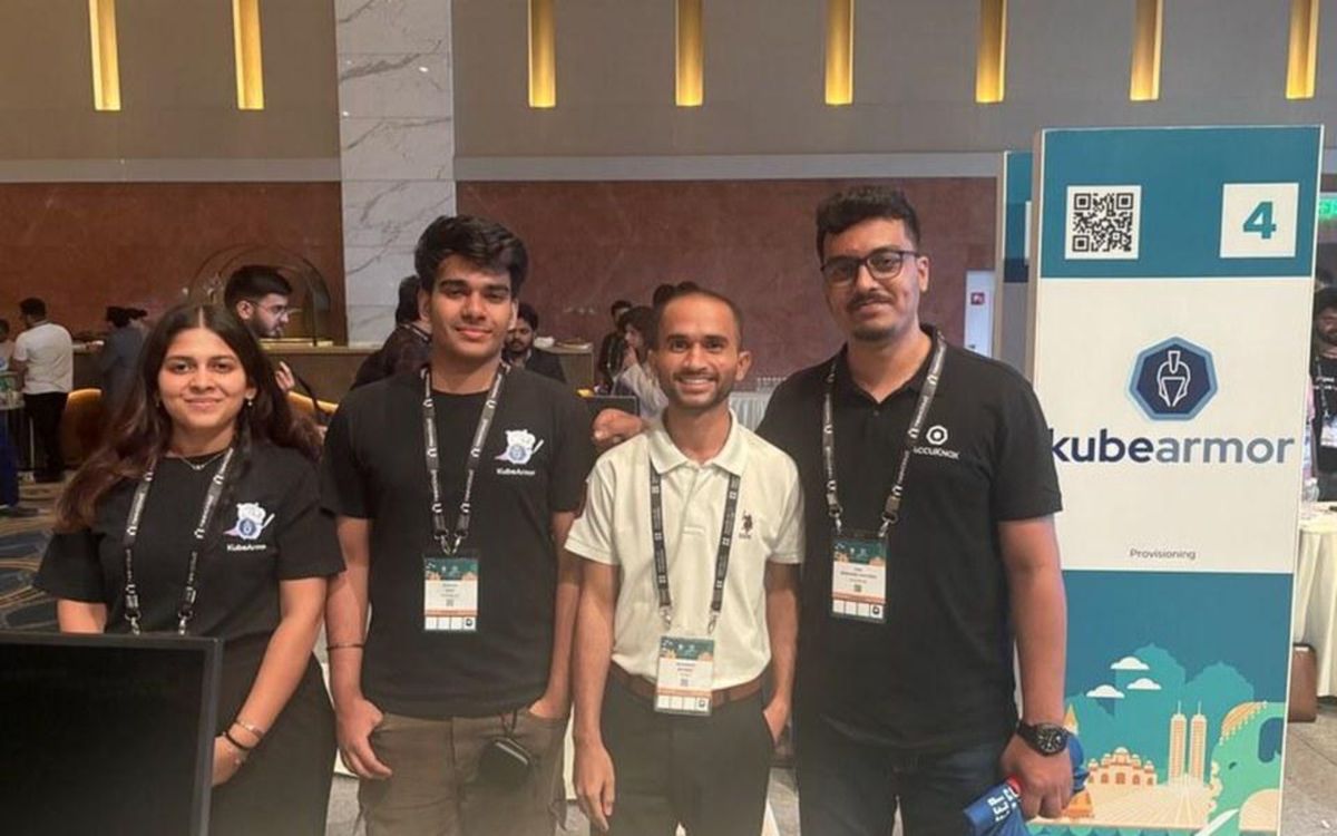 Team AccuKnox at the KubeArmor booth, KubeCon India